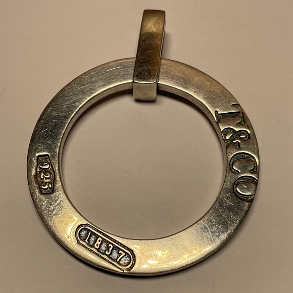 Tiffany & Co. Jewelry - AUTHENTIC TIFFANY & CO. STERLING SILVER ROUND PENDANT. 1.5 inch diameter